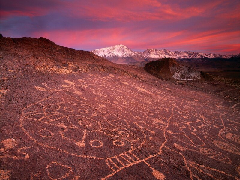 Rock Carvings on Hillside — Red, Dramatic