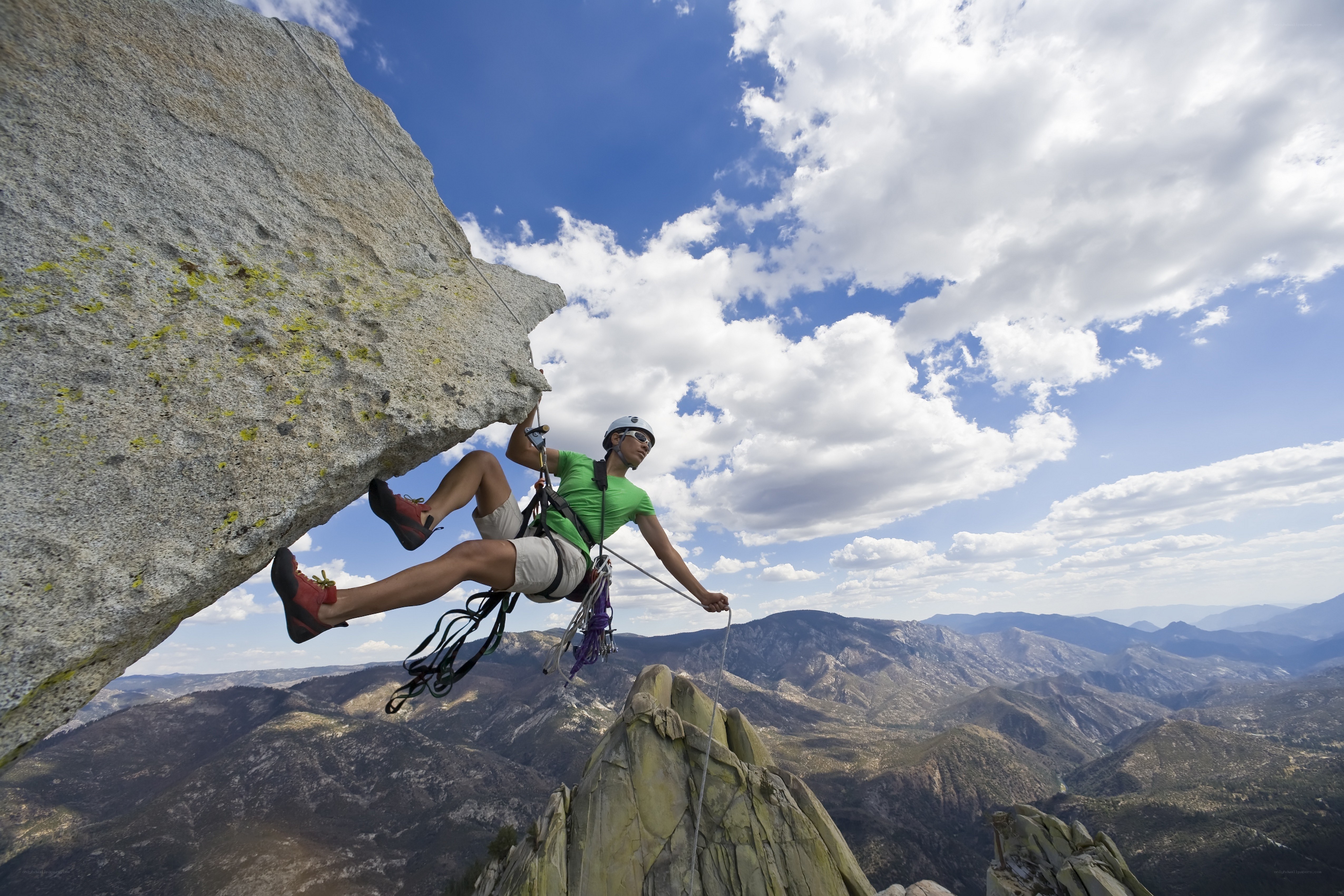 Rock climber on a steep face