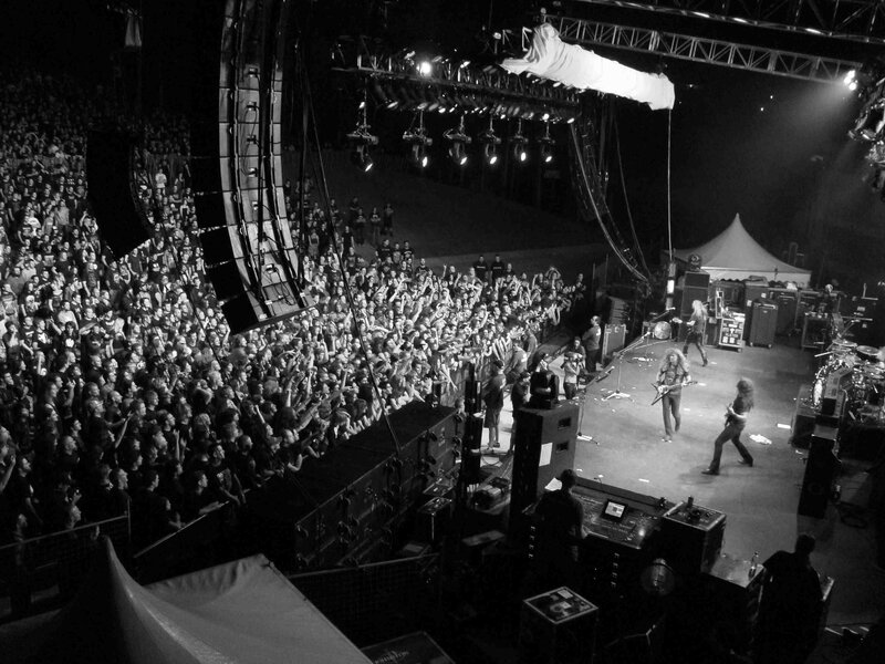 Rock concert crowd and band