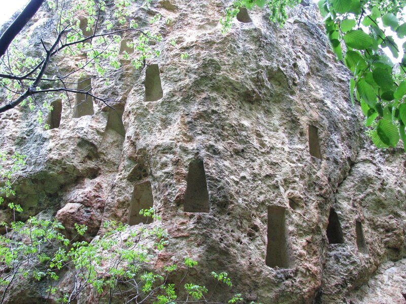 rock face with carved niches