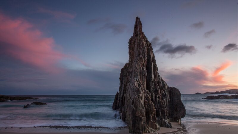 Rock Formation at Beach — Purple, Dramatic