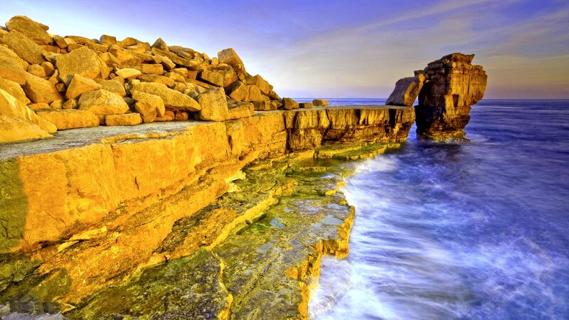 Rock Formation at Coastline — Blue, Dramatic