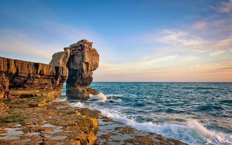 Rock Formation at Coastline — Blue, Serene