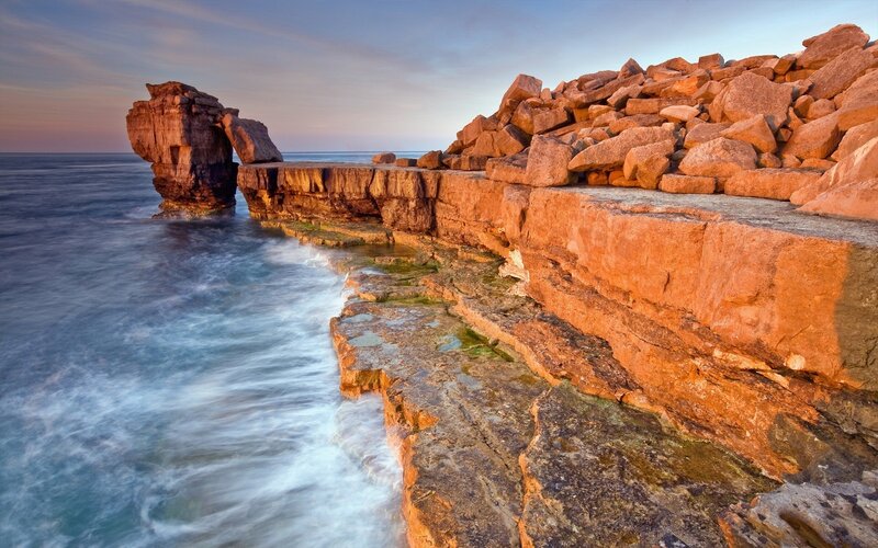 Rock Formation at Coastline — Orange, Dramatic, Sunset, Photograph