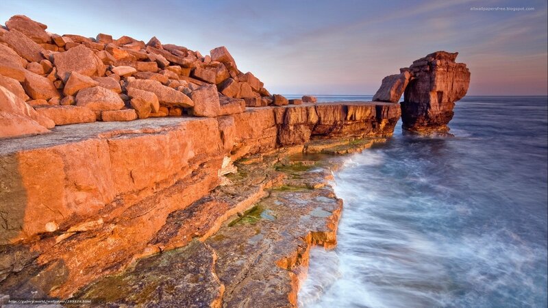 Rock Formation at Coastline — Orange, Serene, Sunset