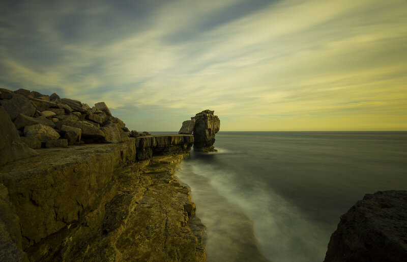 Rock Formation at Coastline — Yellow