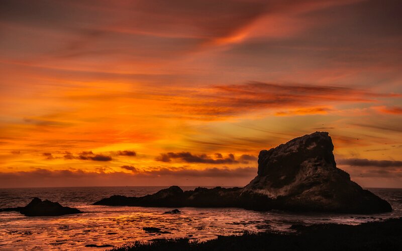 Rock Formation at Sunset — Orange, Dramatic, Photograph, Ocean, Sky, Clouds