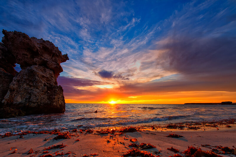 Rock Formation at Sunset — Orange, Dramatic, Photograph, Ocean, Sky, Sand