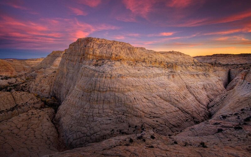 Rock Formation at Sunset — Purple, Dramatic, Photograph, Sky, Clouds, Desert