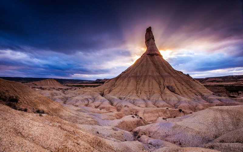 Rock Formation at Sunset — Purple, Dramatic, Photograph, Sky, Clouds