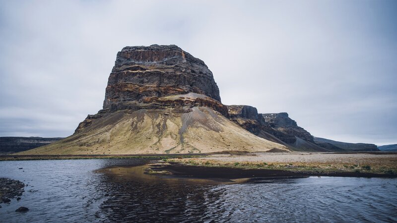 Rock Formation by River — Gray