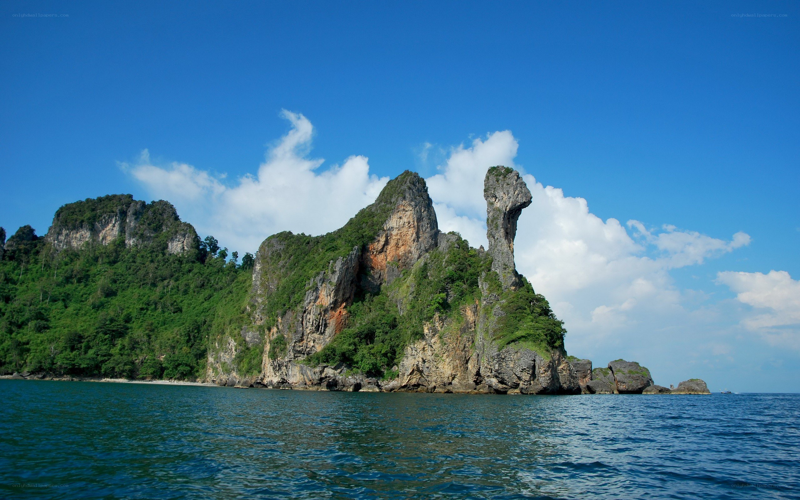 rock formation in blue sea