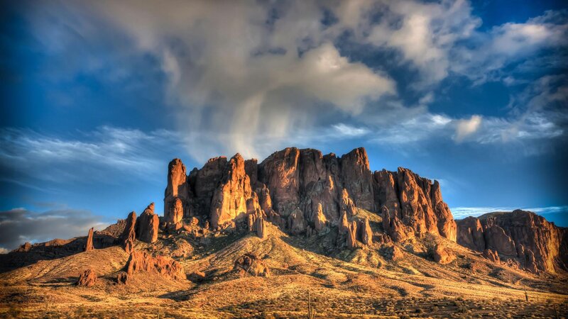 Rock Formation in Desert — Blue, Dramatic, Sunset, Photograph, Mountain, Clouds