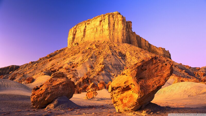 Rock Formation in Desert — Blue, Dramatic, Sunset, Photograph, Sand