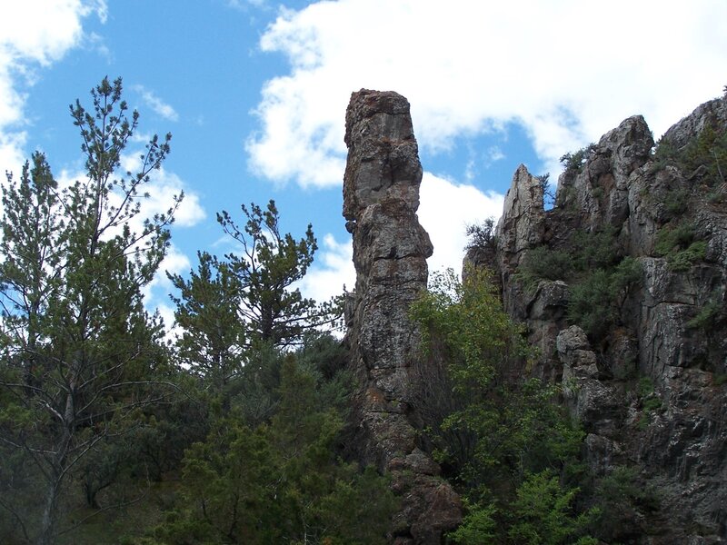 Rock Formation in Forest — Blue