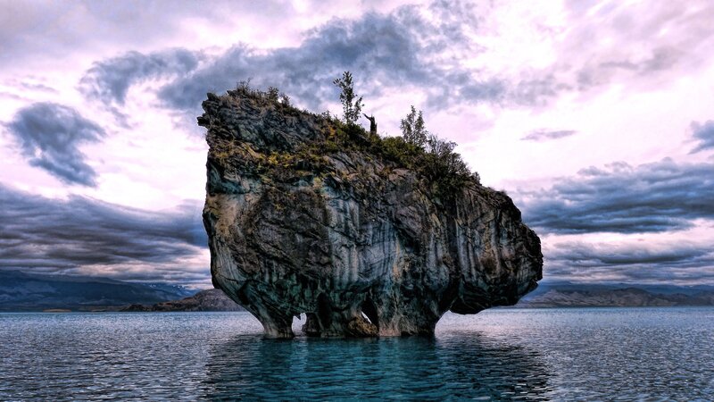 Rock Formation in Lake — Blue, Dramatic, Sunset, Photograph, Clouds, Mountains