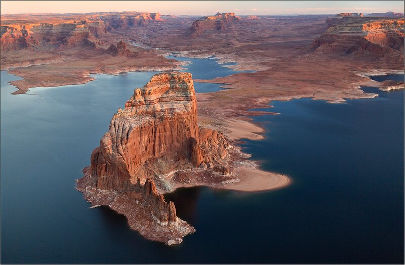 Rock Formation in Lake — Blue, Serene, Sunset, Photograph, Cliffs