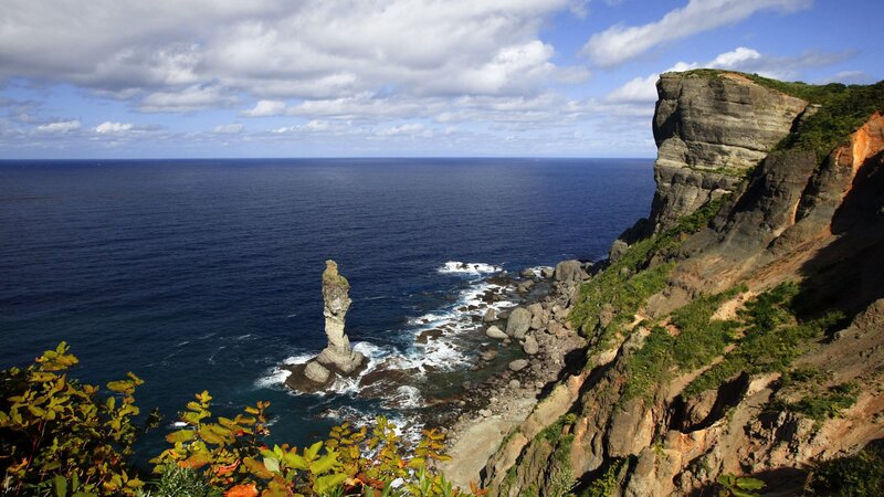 Rock Formation in Ocean — Blue, Dramatic, Afternoon, Photograph, Cliff
