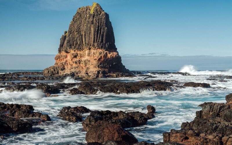 Rock Formation in Ocean — Blue, Dramatic, Afternoon, Photograph, Waves, Sky
