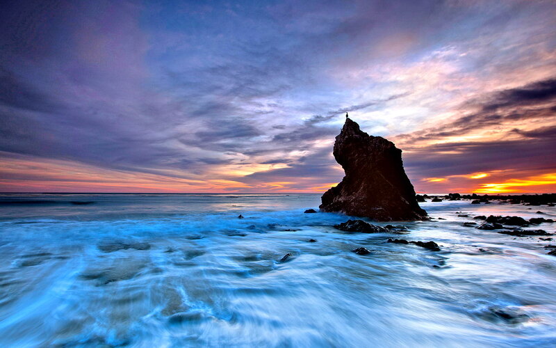Rock Formation in Ocean — Blue, Dramatic, Sunset, Photograph, Sky, Clouds