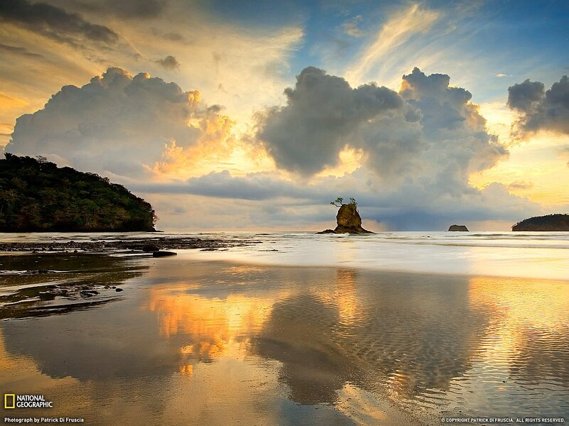Rock Formation in Ocean — Blue, Dramatic, Sunset, Photograph