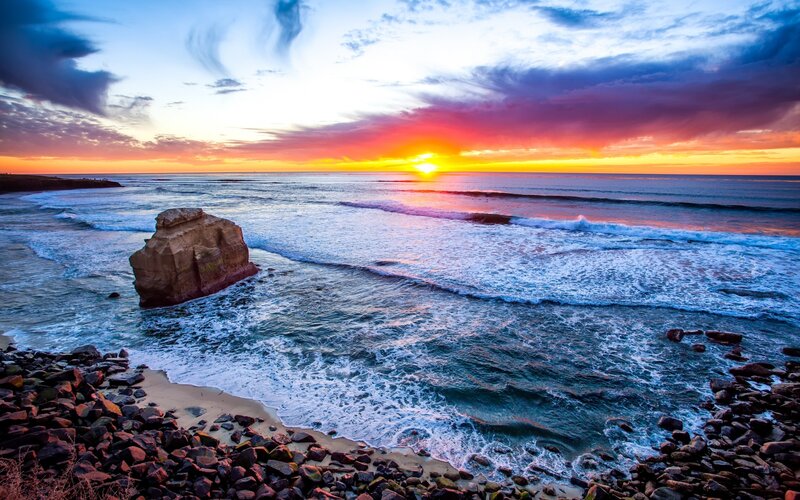 Rock Formation in Ocean — Blue, Dramatic, Sunset, Photograph, Waves, Sky