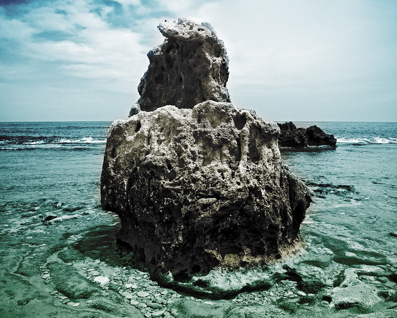 Rock Formation in Ocean — Blue, Serene, Photograph, Sky