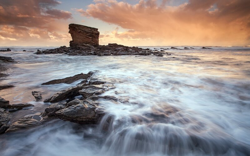 Rock Formation in Ocean — Orange