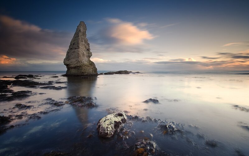 Rock Formation in Ocean — Serene