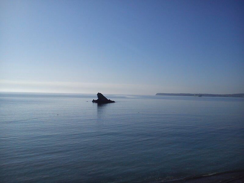 Rock Formation in Sea — Blue, Calm
