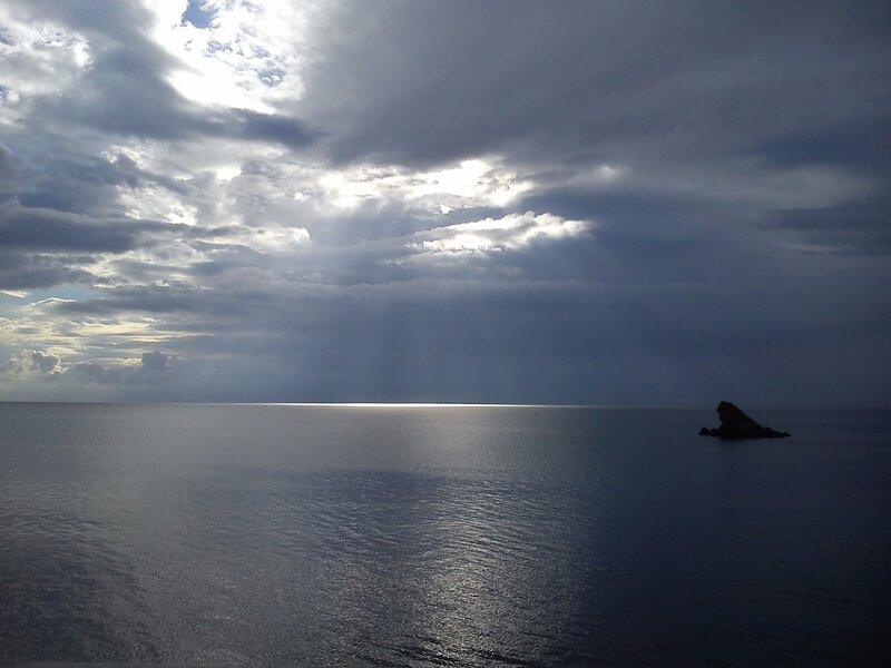 Rock Formation in Sea — Blue, Dramatic, Afternoon