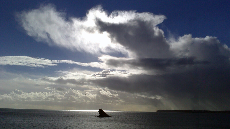 Rock Formation in Sea — Blue, Dramatic