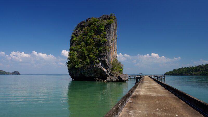 Rock Formation in Sea — Blue, Serene, Afternoon, Photograph, Pier