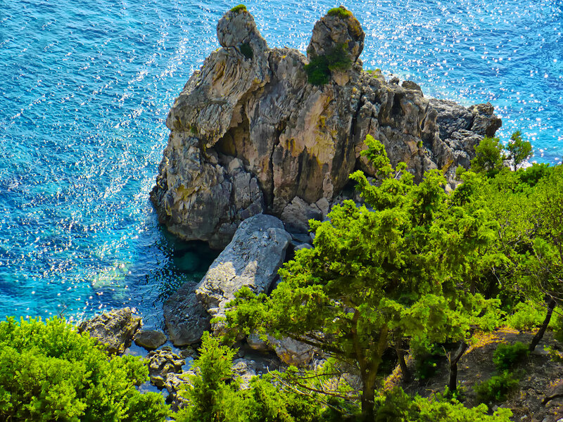 Rock Formation in Sea — Blue, Serene, Afternoon
