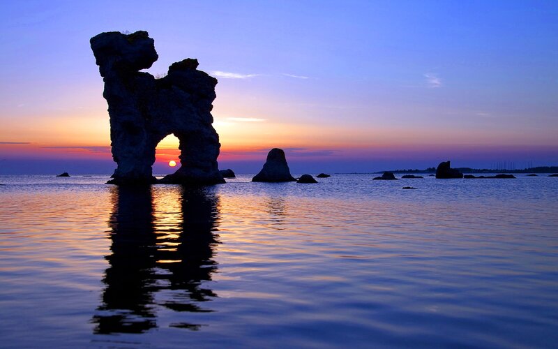 Rock Formation in Sea — Blue, Serene, Sunset