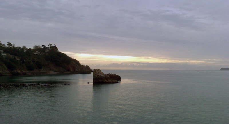 Rock Formation in Sea — Gray, Calm