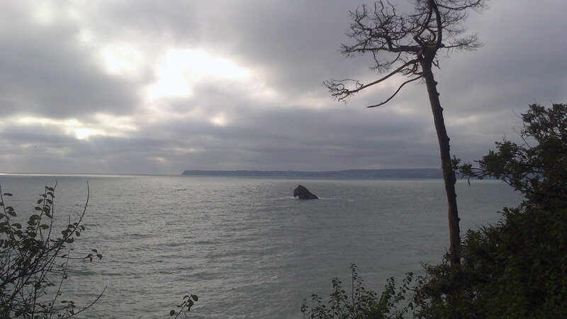 Rock Formation in Sea — Gray, Overcast