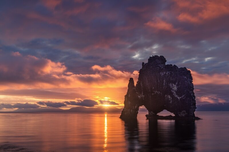 Rock Formation in Sea — Orange, Dramatic