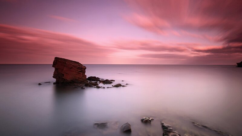 Rock Formation in Sea — Pink