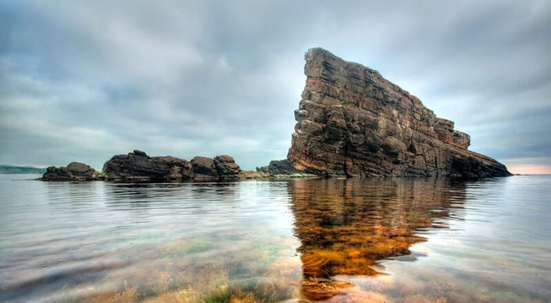 Rock Formation in Water — Blue, Serene, Photograph