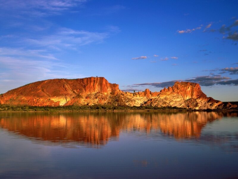 Rock Formation in Water — Blue, Serene, Sunset, Photograph, Mountain