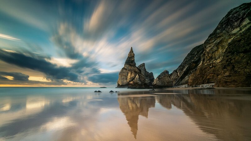 Rock Formation on Beach — Blue, Dramatic, Sunset, Photograph, Sea