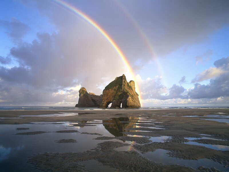 Rock Formation on Beach — Blue, Serene, Afternoon, Photograph, Rainbow, Ocean