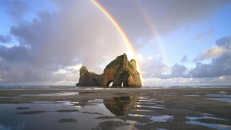 Rock Formation on Beach — Blue, Serene, Afternoon, Photograph, Rainbow