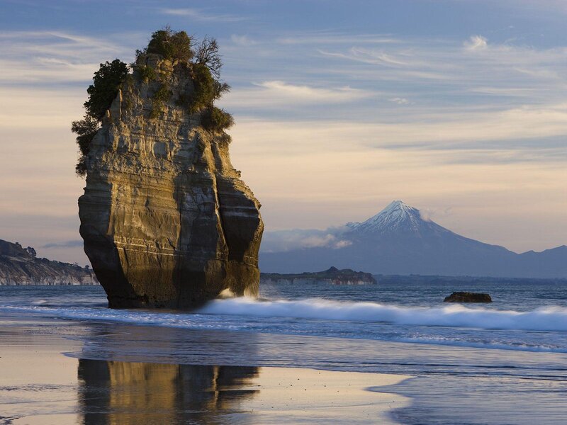 Rock Formation on Beach — Blue, Serene, Sunset, Photograph, Mountain