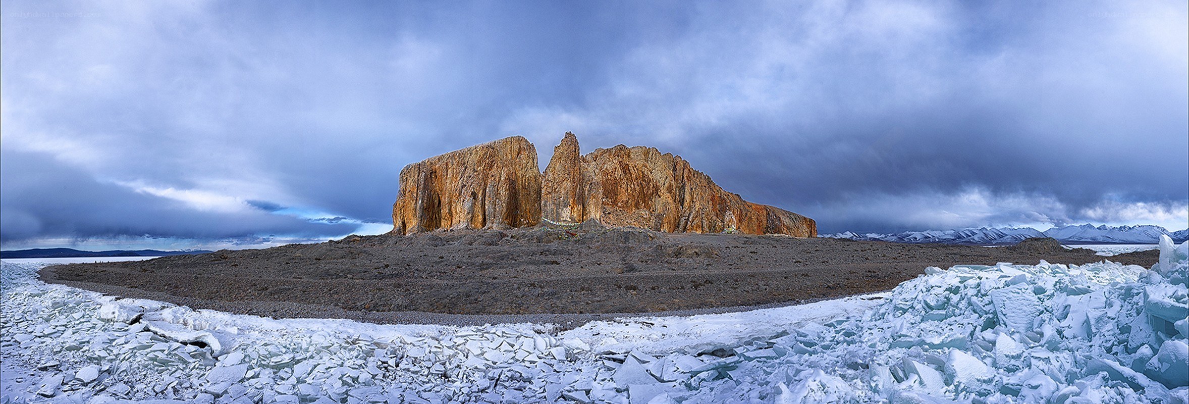 Rock formation on icy landscape