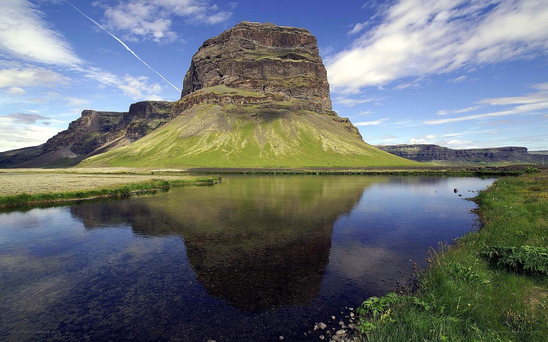 Rock formation reflected in a lake