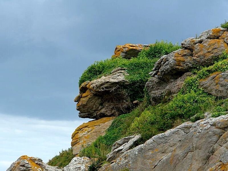Rock Formation Resembling a Face — Gray