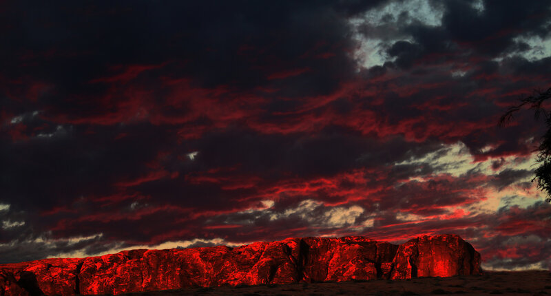 Rock Formation under Red Sky