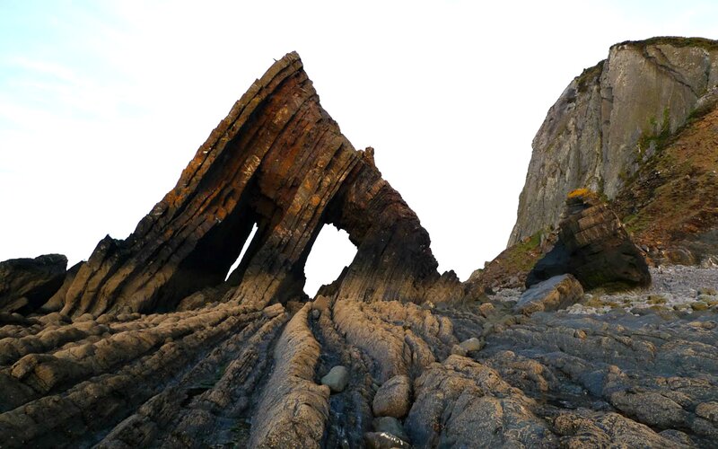 Rock Formation with Arch — Brown